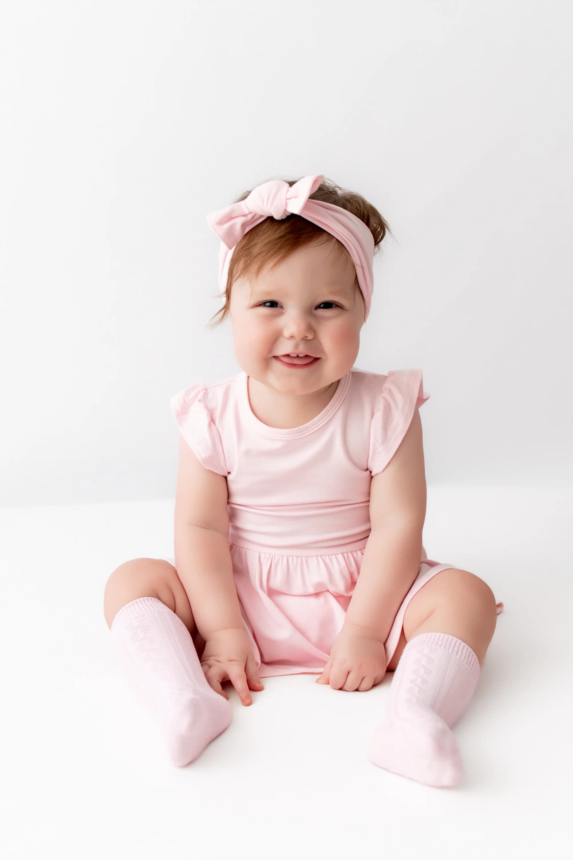 Knee High Socks in Sakura by Kyte Baby