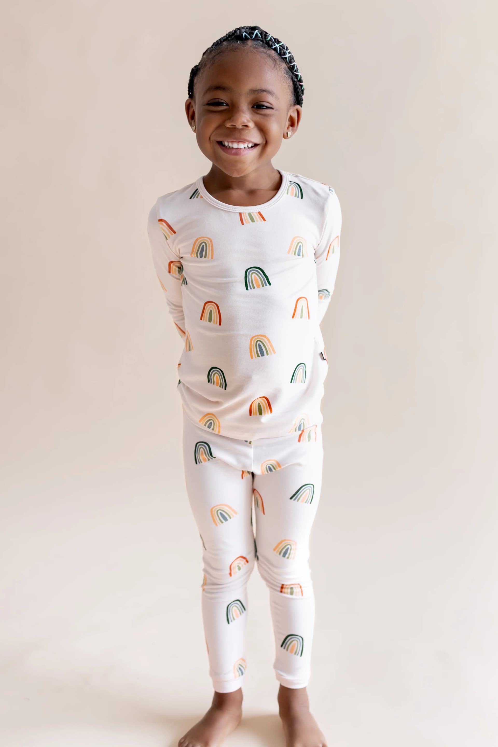 Long Sleeve Pajamas in Retro Rainbow by Kyte Baby
