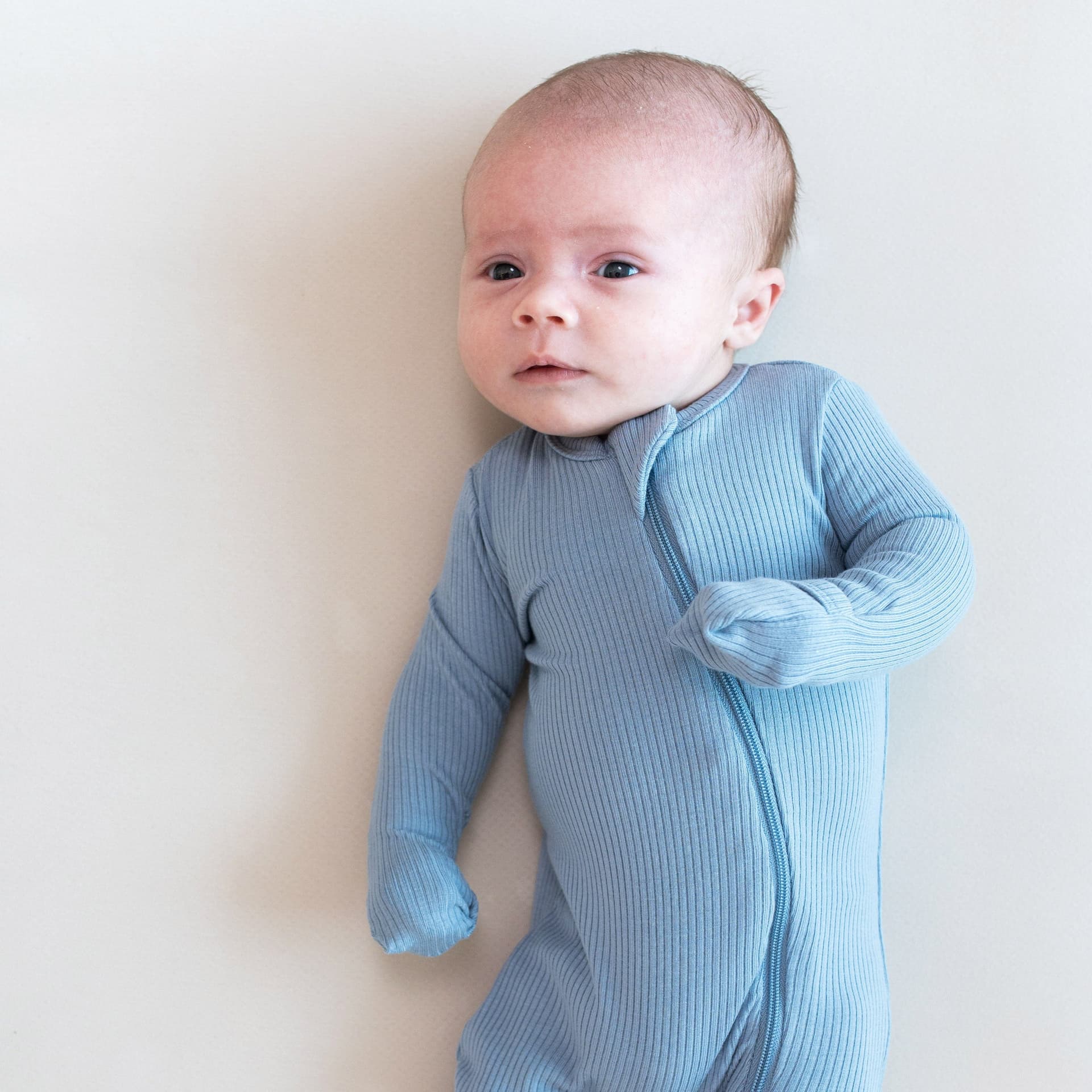 Ribbed Zipper Romper in Slate by Kyte Baby