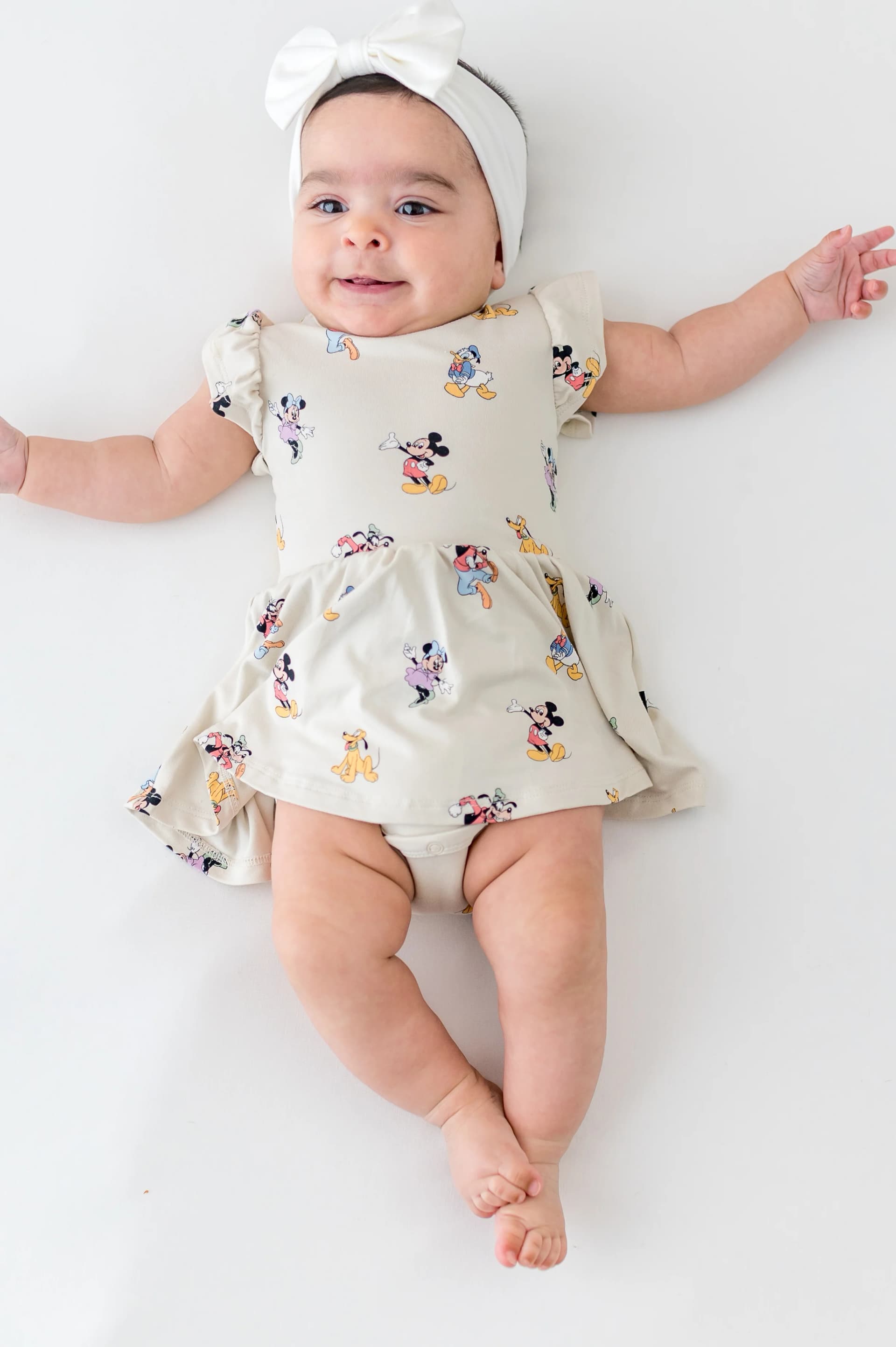 Twirl Bodysuit Dress in Mickey Mouse and Friends by Kyte Baby