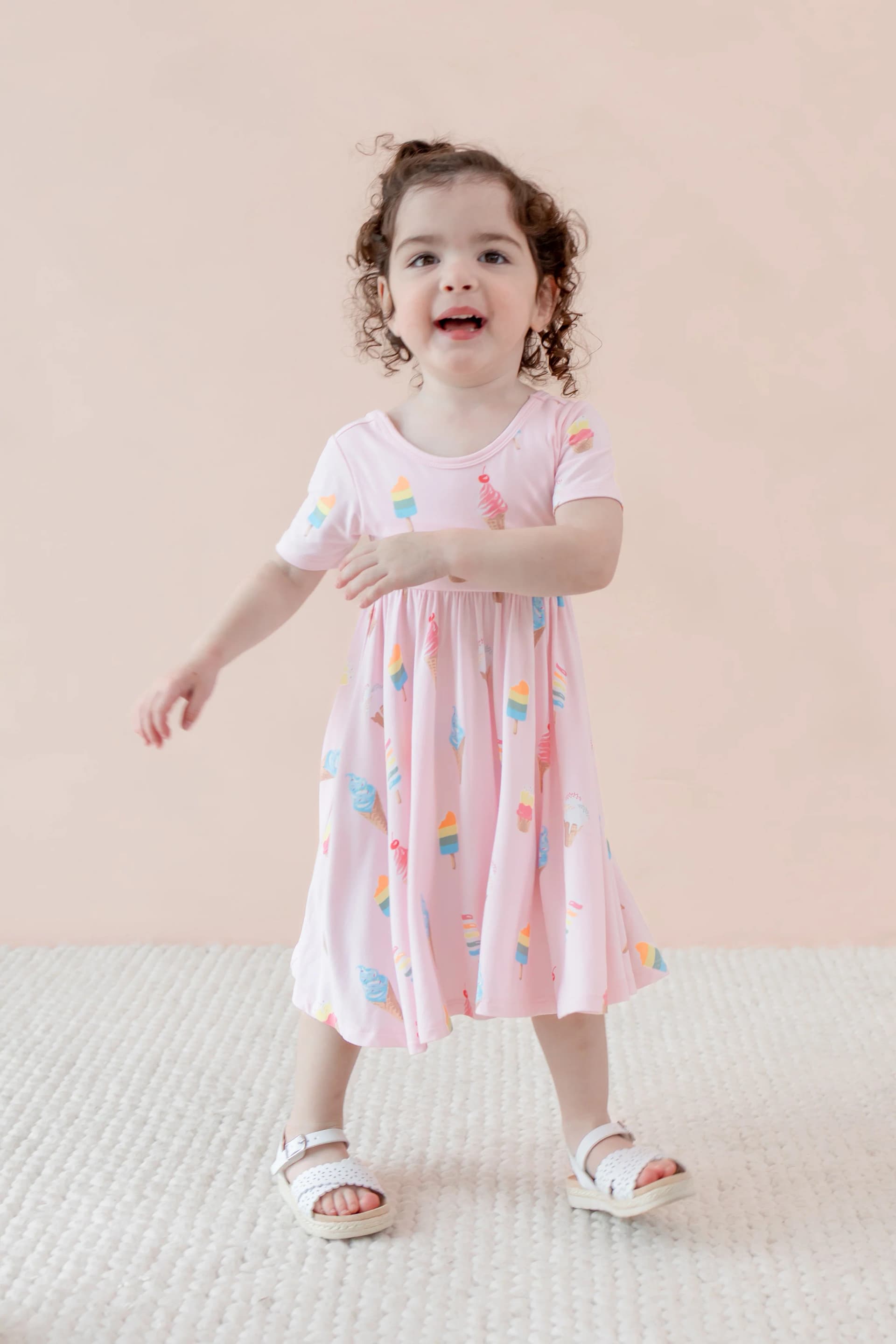 Twirl Dress in Sakura Ice Cream by Kyte Baby