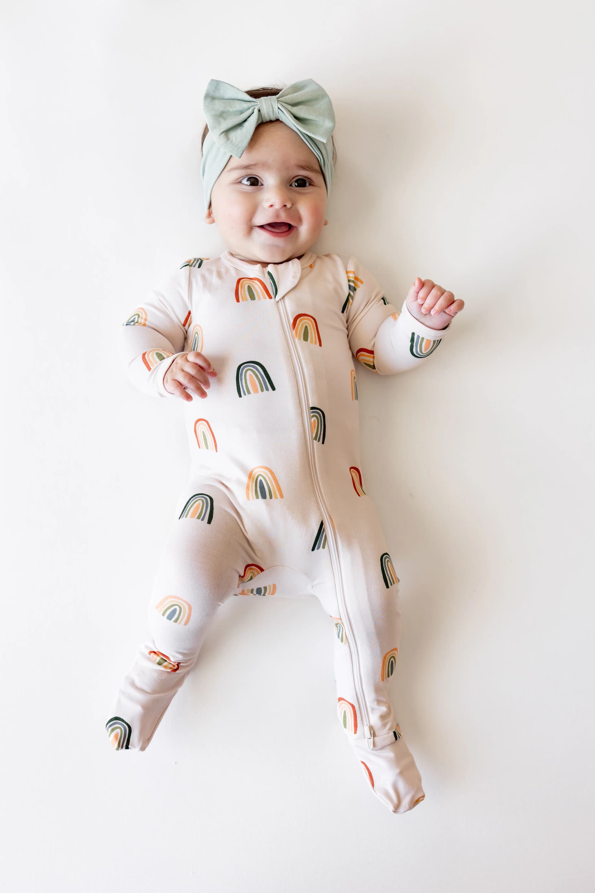 Zippered Footie in Retro Rainbow by Kyte Baby