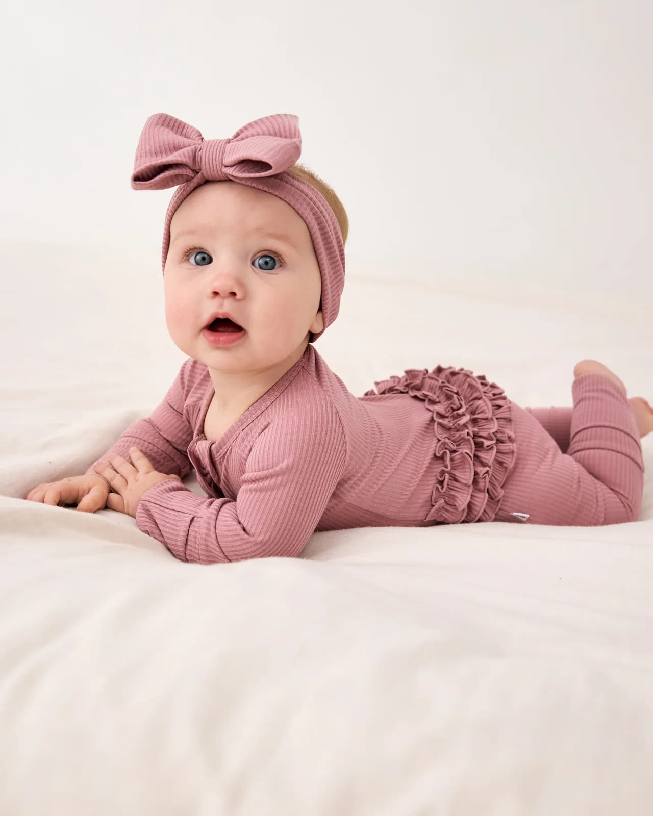 Rosewood Ribbed Ruffle Zippy by Little Sleepies