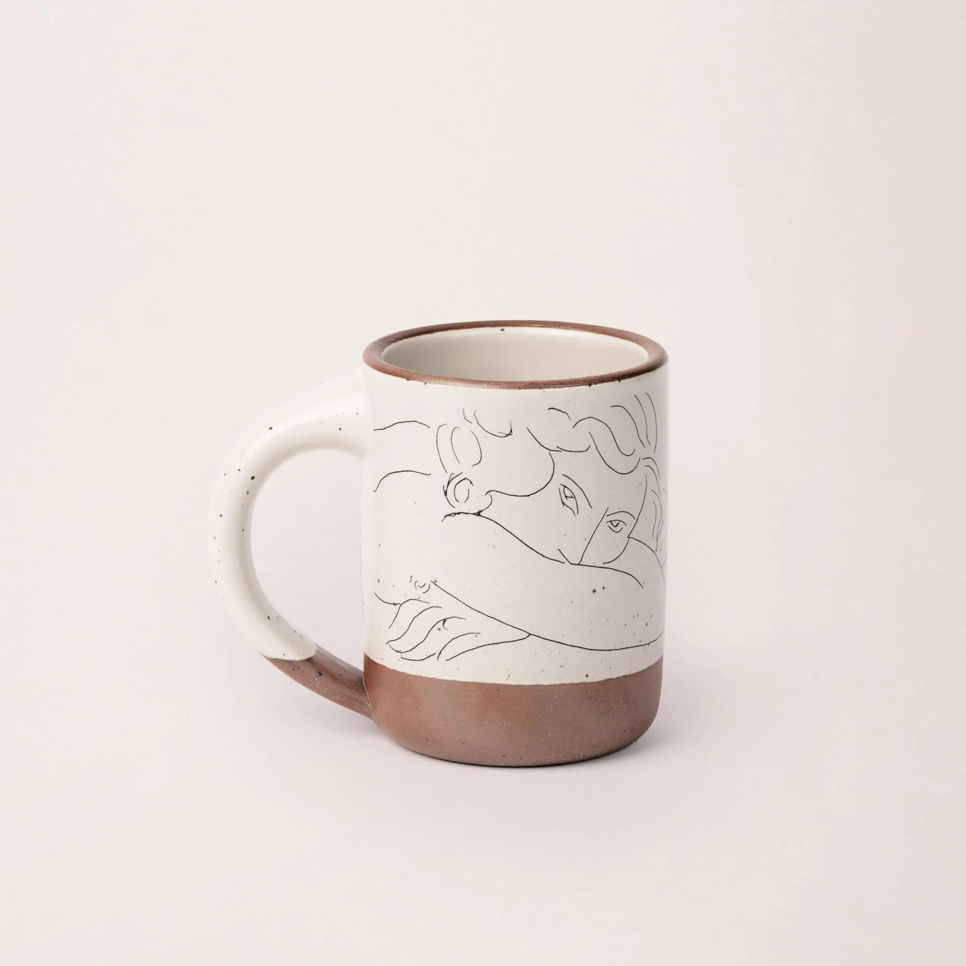The Mug, Jeune femme le visage enfoui dans les bras by East Fork